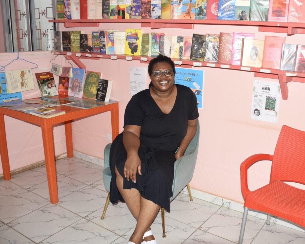 Edwige-Renée Dro, literary translator and activist, in her library of women's writings from Africa and the black world in Abidjan.